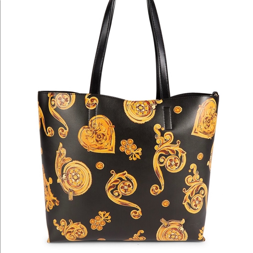 Reversible 💯 % Authentic Versace Jeans Couture .